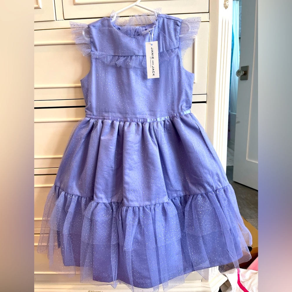Beautiful lavendar dress with silver sparkles. Brand new, never worn.